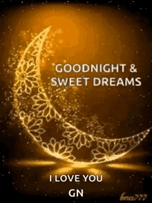 a glowing crescent moon with the words `` goodnight and sweet dreams `` written on it .