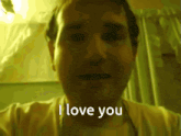 a man is saying i love you in a dark room