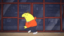 a yellow cartoon character with the letter b on his chest