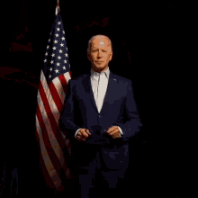 a man in a suit wearing a mask that says ' u.s. ' on it
