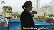 a man in a suit stands in front of a blue car with the words roger that on my way above him