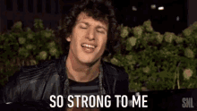 a man says so strong to me in front of a snl logo