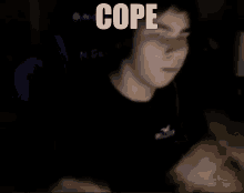 a blurry picture of a man with the word cope on the bottom right