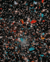 a black background with a lot of bubbles and confetti