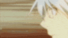 a close up of a person 's head with white hair