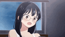 the girl is wearing glasses and a white tank top .