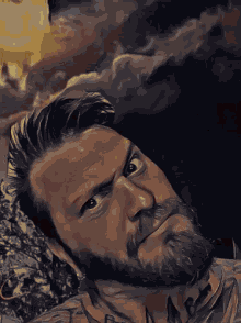 a painting of a man with a beard and a tattoo on his neck