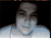a pixelated image of a man 's face with red and blue dots on it