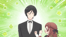 a man in a tuxedo and bow tie stands next to a little girl