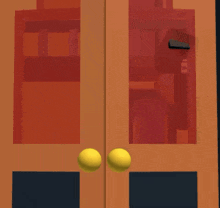a close up of a door with yellow handles