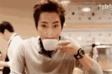 Kim Drinking Coffee GIF