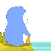 a blue and white penguin is sitting on a rock