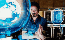 Tinkering Tony Stark GIF - Tinkering Tony Stark Tony GIFs