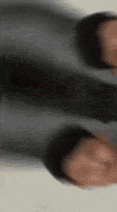 a close up of a person 's feet with a blurred background