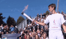 Trasnfering Fire Torch GIF - Trasnfering Fire Torch Olympic Starts GIFs