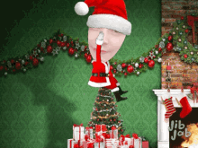 a christmas tree with gifts and a fireplace with jib jab written on the wall
