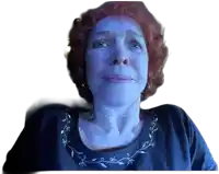 a woman with red hair is wearing a black shirt and earrings