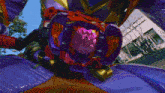 a purple and blue robot with a purple belt