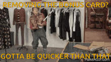 a man standing in front of a clothes rack with the words " removing the bonus card "