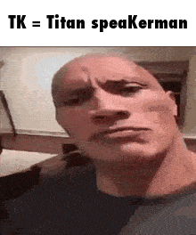 a close up of a man 's face with a caption that says tk = titan speakerman .