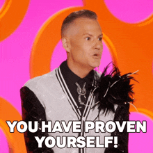 a man in a black and white suit is saying you have proven yourself
