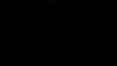 a robot with a yellow light coming out of it