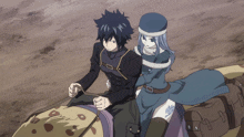a man and a woman are sitting on a horse drawn carriage