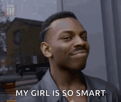 a man is smiling and saying 
