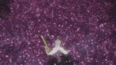 a purple background with a lot of pink flowers falling from the sky