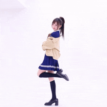 a girl wearing knee high socks and black shoes