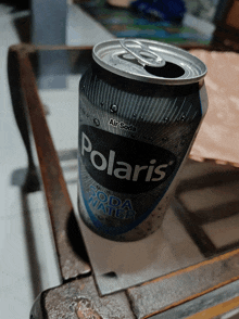 a can of polaris soda water is sitting on a table