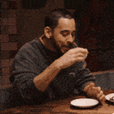 Awkward Sip Coffee Sips Coffee GIF