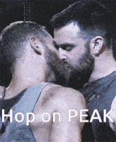 a poster of two men kissing with the words hop on peak at the bottom