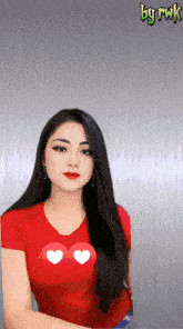 a woman in a red shirt with hearts on it