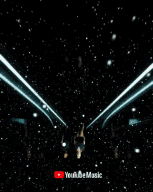 a youtube music ad shows a person flying through a tunnel