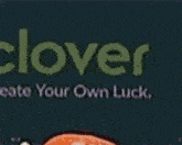a stuffed animal wearing a hat with the word clover written on it