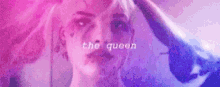 a close up of a woman 's face with the words `` the queen '' written in the background .