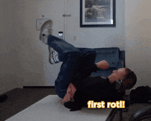 a man is laying on his back with the words first rot written on the bottom