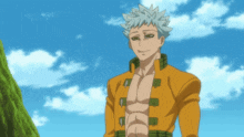 a man in a yellow jacket stands in front of a cloudy sky