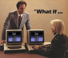 a man standing next to a woman using a computer with the words " what if " written on the bottom