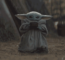 Baby Yoda The Mandalorian GIF - Baby Yoda The Mandalorian Sips Tea GIFs