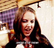 a woman says shove it up them while pointing
