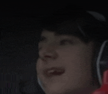 a close up of a person wearing headphones