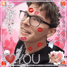 a picture of a man with glasses and kisses on his face and neck with the words " i love you " in the corner