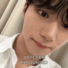 a close up of a man 's face with the words " vote for kim junseo " below it