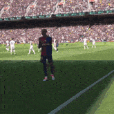 a soccer player wearing a number 19 jersey stands on the field