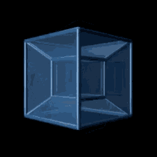 a clear plastic cube is floating in the air on a black background .