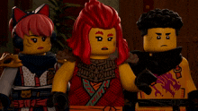 three lego characters are standing next to each other and one of them has a tattoo on her face