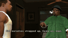 a man in a green shirt is talking to another man in a white tank top