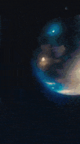 a close up of a sphere with a blue light shining through it